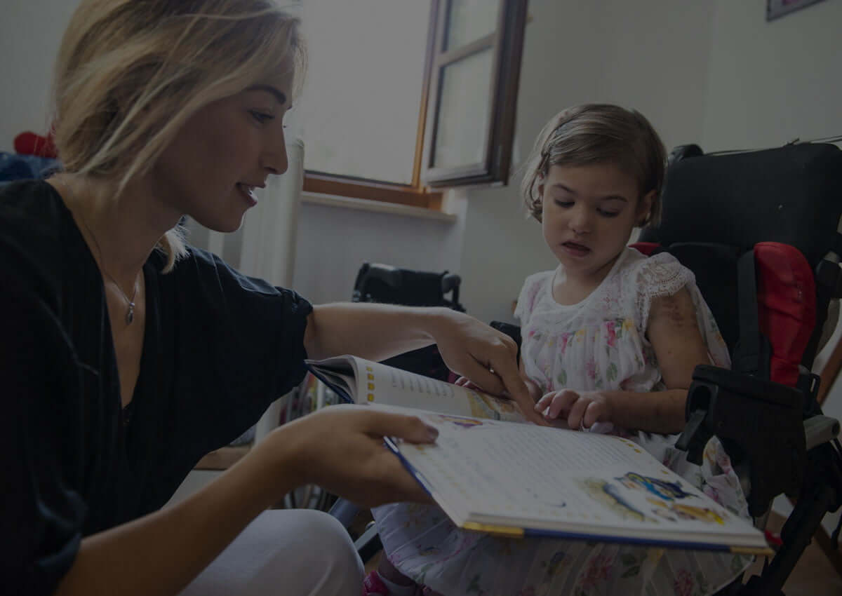 Bambino con maestra